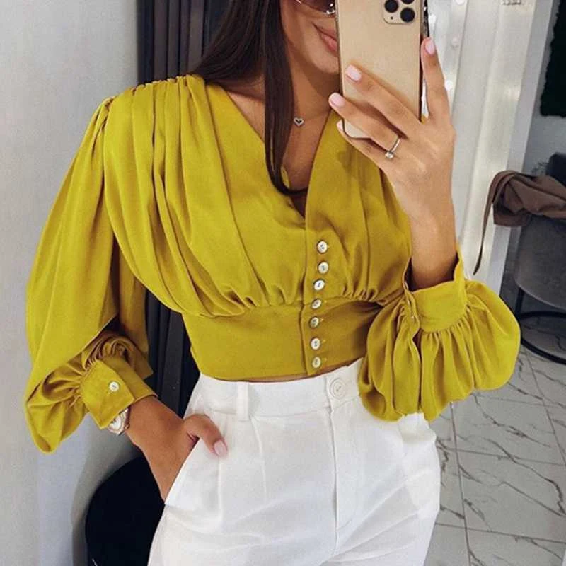 Title 39, Ladies turtleneck satin shirt Elevate your styl...