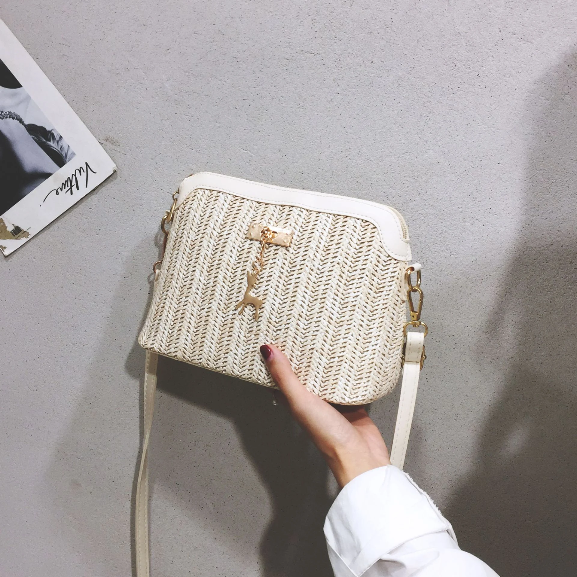 Title 9, Straw Shell Fawn Female Bag. A stylish and func...