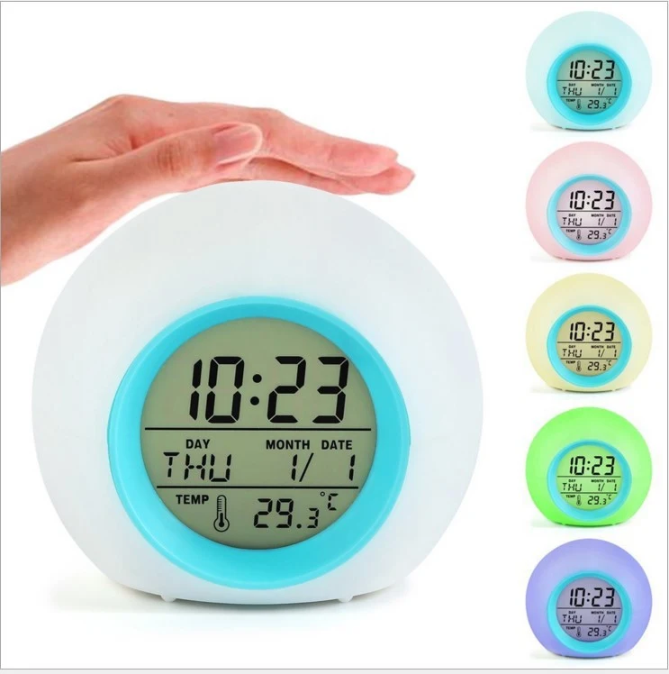 Round colorful alarm clock to wake up happy. Easy to read, with a variety of colors to match your bedroom decor. — photo 4