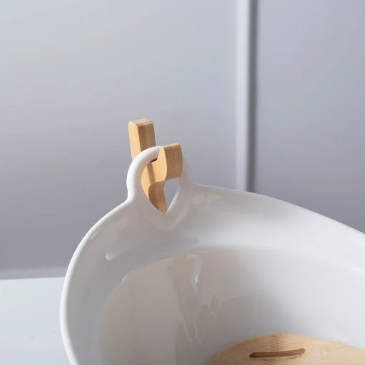Title 5, Handled Binaural Ceramic Fruit Dessert Bowl. El...