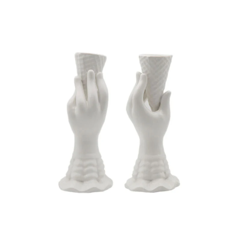 Title 5, Modern Art Hand Holding Ice Cream Ornaments. Un...