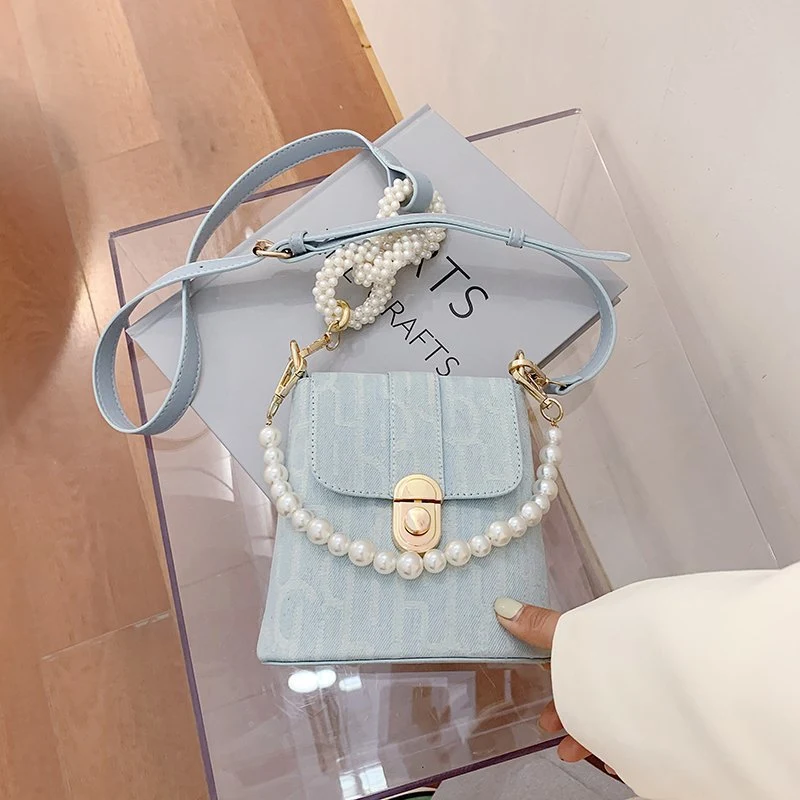 Title 56, Bolsa Bucket Simples e Versátil