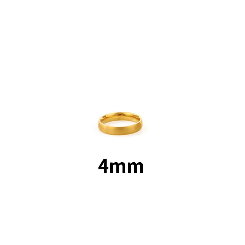 Anel liso feminino em ouro 18k e aço titânio. Combinação perfeita de elegância e resistência para uso diário ou ocasiões especiais. — foto 6