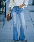 Pantalones vaqueros lavados de corte entallado para mujer con bolsillos, cómodos y versátiles para un look casual diario. — foto 2