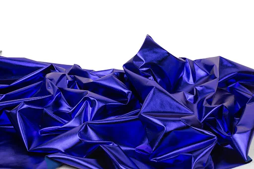 Title 8, Tessuto Spandex Oro Lucido con Superficie Gloss...