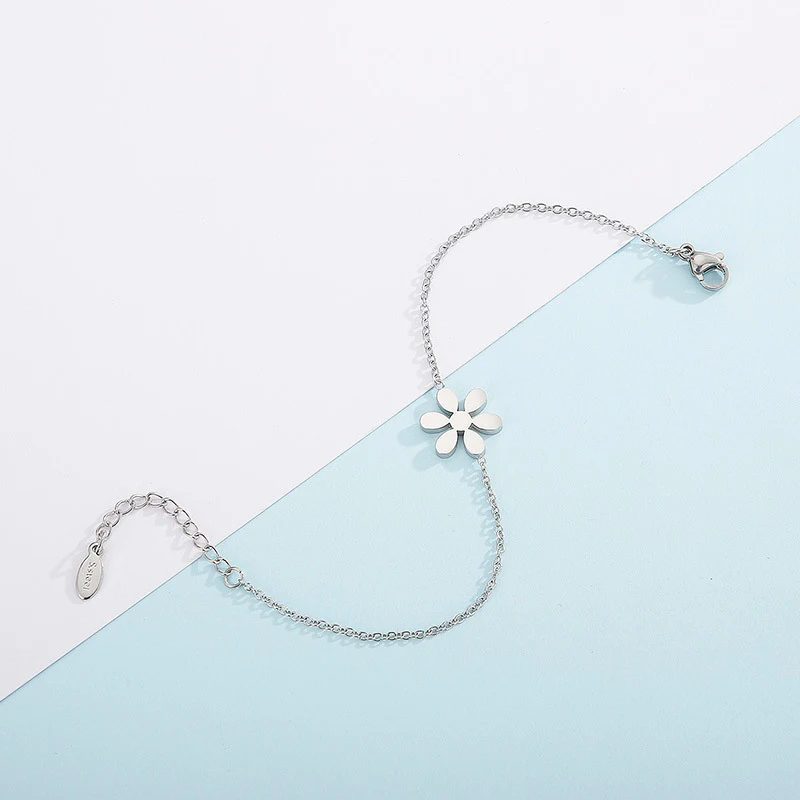 Pulseira de aço inoxidável com padrão floral simples, ideal para um toque de elegância natural, durável e perfeita para uso diário. — foto 15