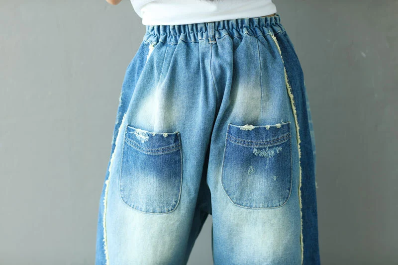 Jeans elásticos con cintura de borla y corte roto, estilo vintage. Perfectos para un look cómodo y moderno. Disfruta de la moda. — foto 5