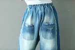 Jeans elásticos con cintura de borla y corte roto, estilo vintage. Perfectos para un look cómodo y moderno. Disfruta de la moda. — foto 5