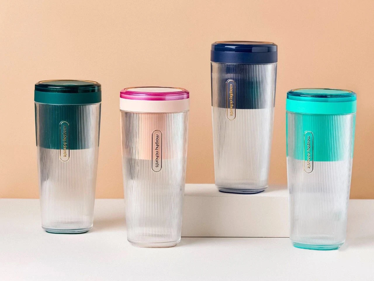Title 1, Wireless juicing cup for fresh juices on the go...