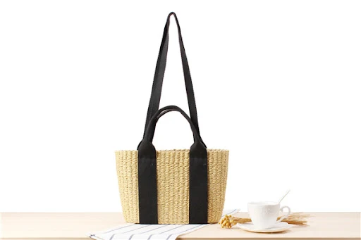 Title 4, Semi-circle fringed one-shoulder straw woven ba...
