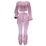 Conjunto de duas peças feminino, top de manga longa com recorte na cintura. Ideal para um visual moderno e estiloso, perfeito para diversas ocasiões. — foto 1