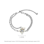 Colar de flores de resina creme estilo francês original para mulheres, corrente de clavícula luxuosa, de minoria, temperamento doce e selvagem. — foto 10