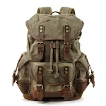 Mochila de montanhismo em couro e lona com costura reforçada para trilhas e escaladas. Aventura ao ar livre com durabilidade e estilo. — foto 5
