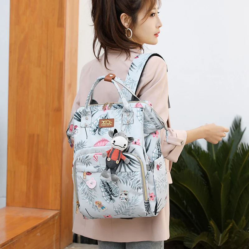 Nova Mochila Coreana para Mamãe, Grande Capacidade, Separação Seco e Molhado, Porta Mamadeira, Fraldas, Bolsa de Bebê Portátil — foto 3