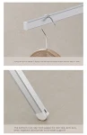 Varal retrátil de aço inoxidável para varanda, perfeito para viagens, compacto e resistente, fácil de instalar e usar, otimiza espaço. — foto 4