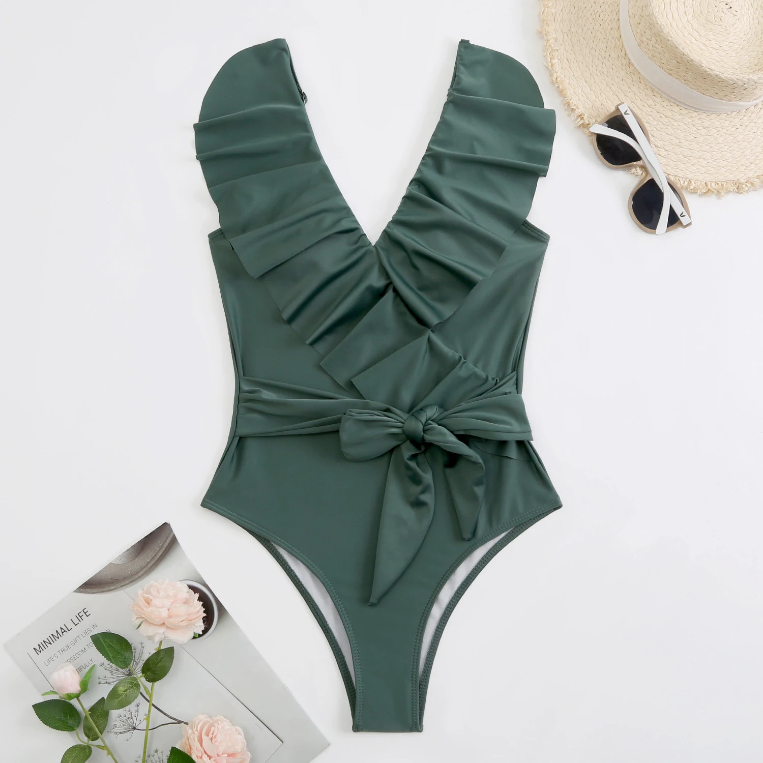 Title 7, Ladies Lace Up One Piece Swimsuit. A stylish a...