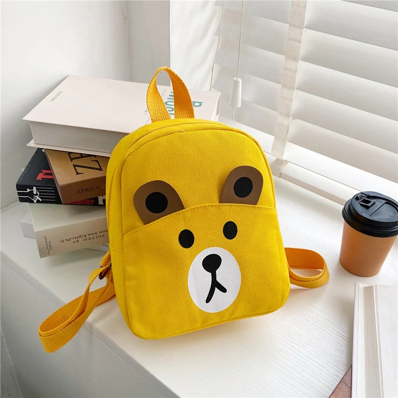 Mochila de lona infantil com estampa de urso de desenho animado. Perfeita para o jardim de infância, leve e espaçosa, ideal para crianças. — foto 3