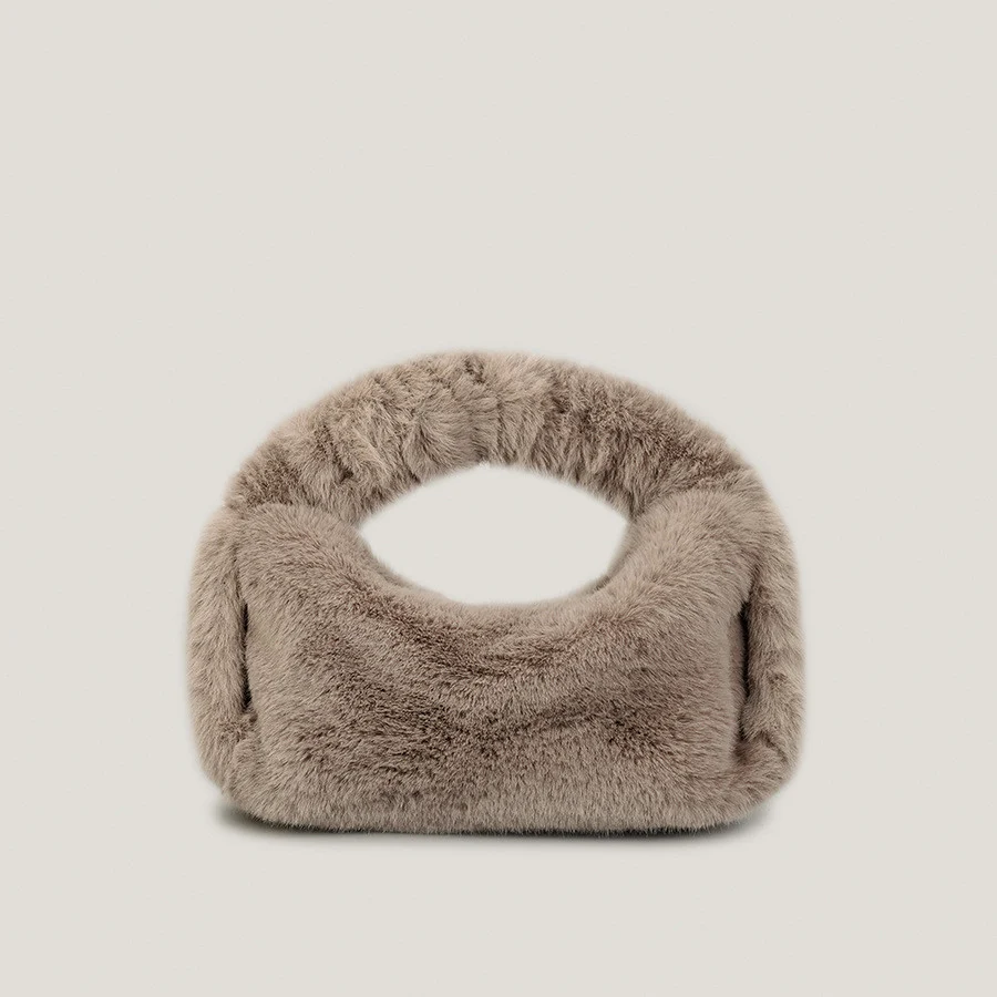 Bolsa de mão elegante e sofisticada com design de dumplings recheados. Perfeita para um look fashion e carregar seus essenciais. — foto 1