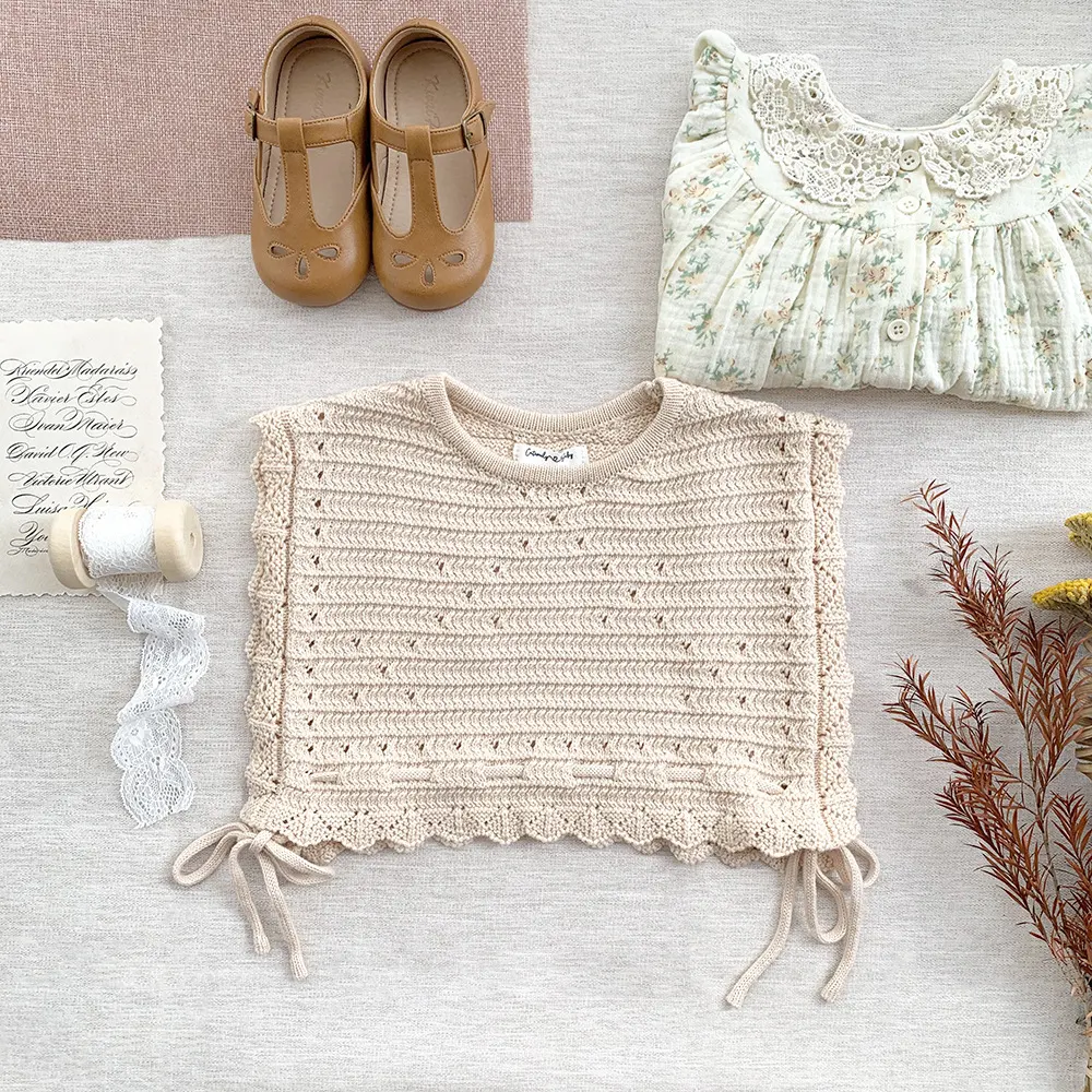 Schattig wollen vest in retro-stijl, ideaal voor een vintage look. Warm en comfortabel, perfect voor elke casual gelegenheid met charme. — foto 8
