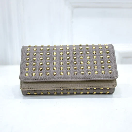 Title 10, Womens Rivet Three-fold Wallet. Keep essential...