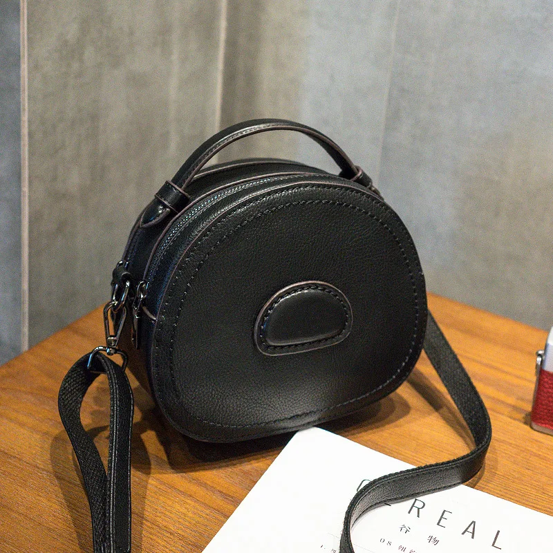 Bolso bandolera retro de un solo hombro, pequeño y redondo. Perfecto para un look moderno y práctico, ideal para llevar tus esenciales con estilo. — foto 2