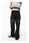 Calças jeans pretas de perna reta e larga, modernas e elegantes, perfeitas para um visual sofisticado e confortável em diversas ocasiões. — foto 8
