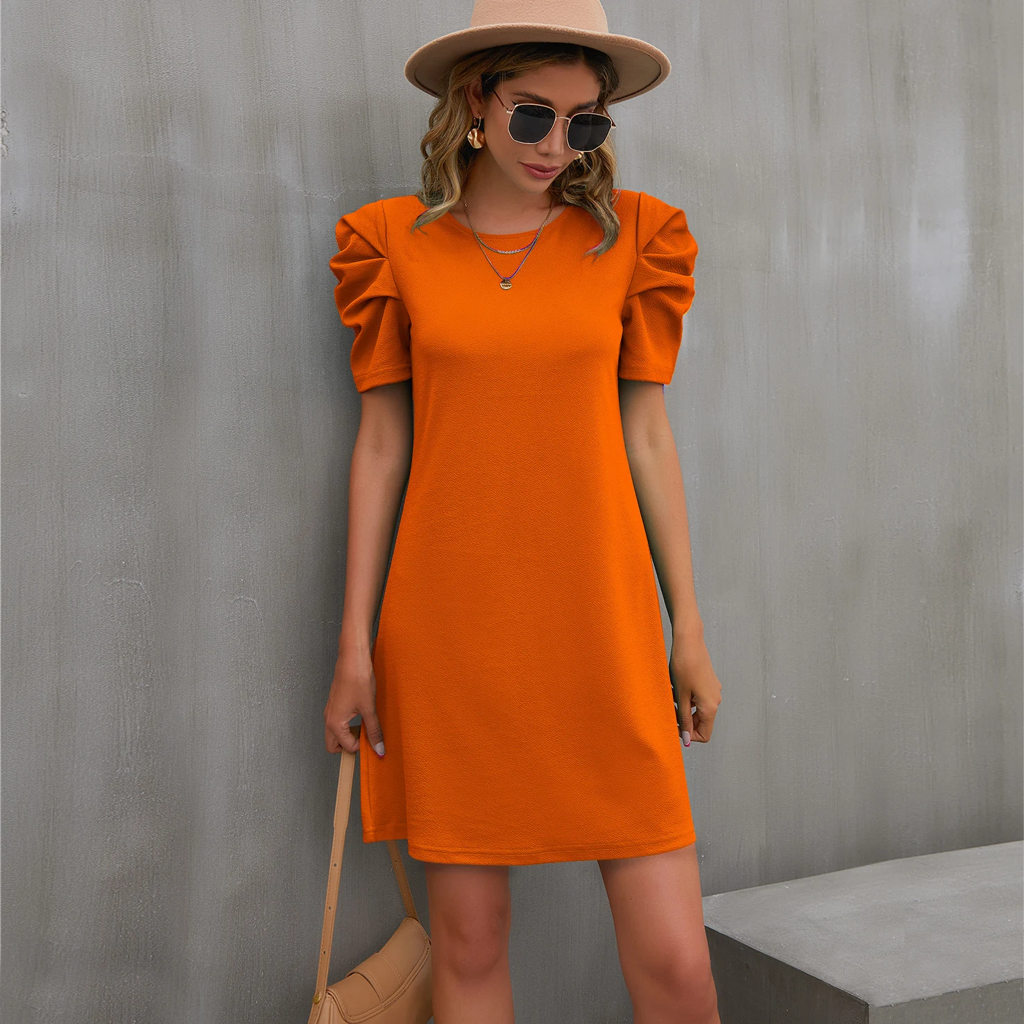 Short-sleeved pleated bubble sleeve oversized solid color mid length dress. Comfortable, stylish, and perfect for any oc — photo 23