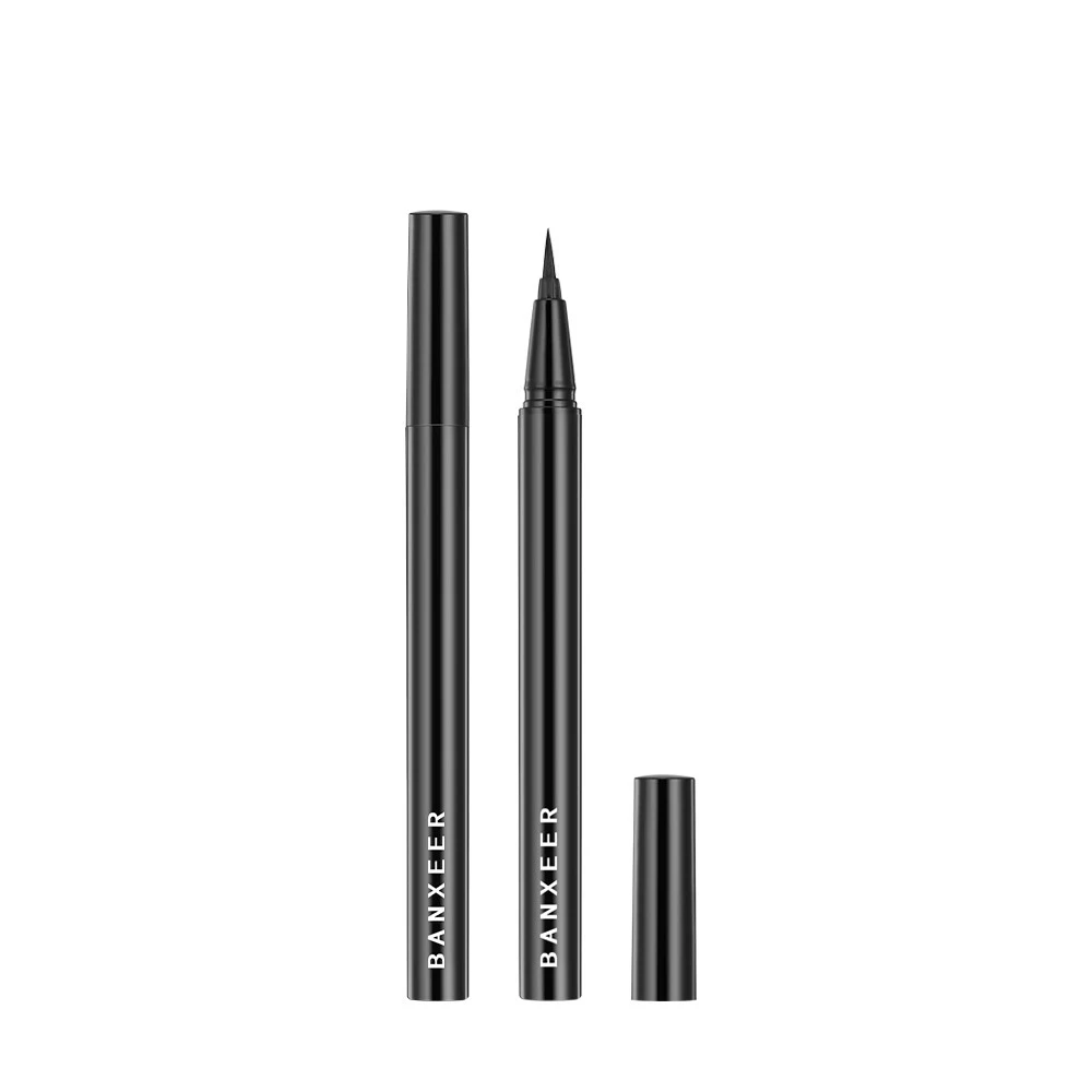 Slim thick black eyeliner pen for a bold eye look. Define your eyes with precision and ease, achieving a long-lasting, e — photo 1
