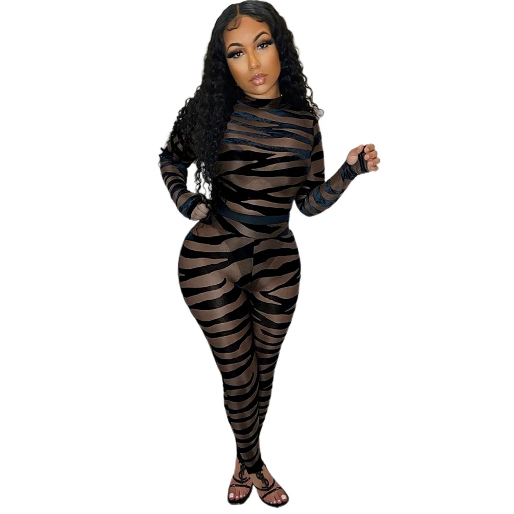 Title 24, Jumpsuit negro de malla con costuras transparen...