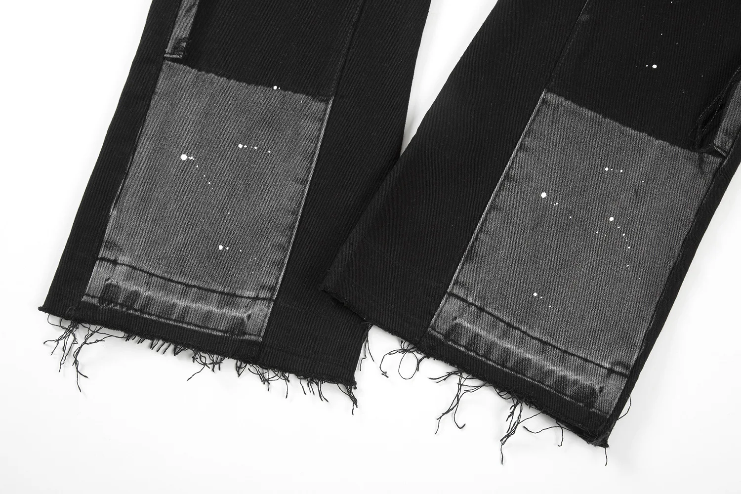 Jeans de hombre High Street lavados, holgados, con costuras y salpicaduras de tinta, para un estilo moderno y cómodo. — foto 5