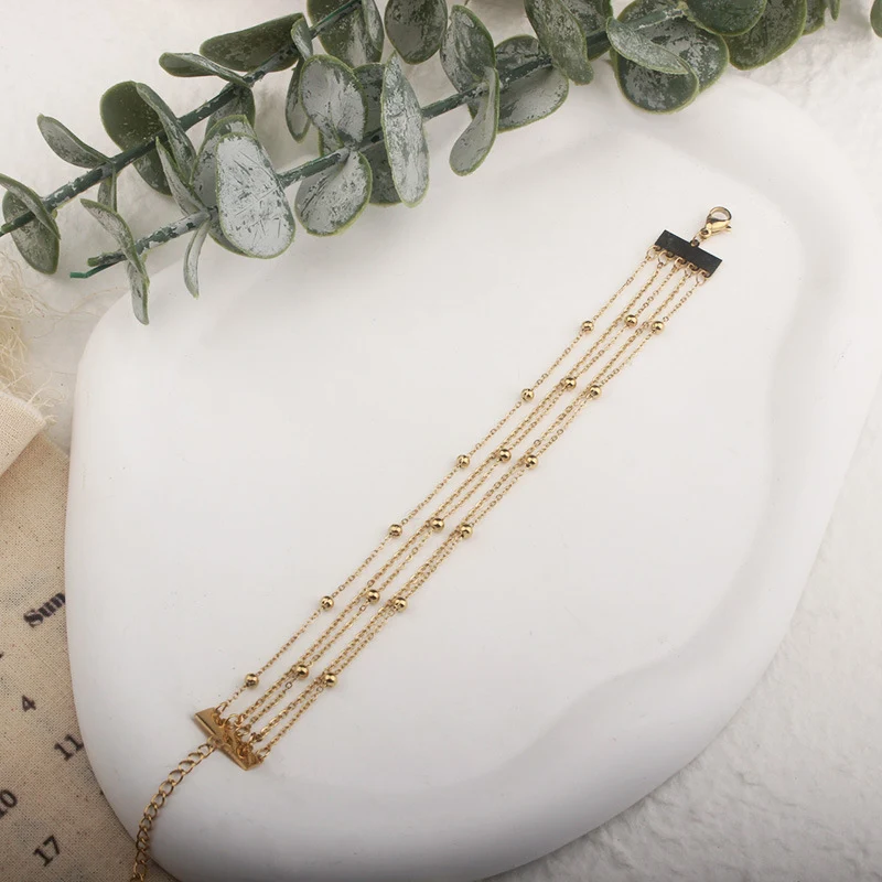 Pulseira de joia romântica com design de coração pentagrama dourado e grão contrastante, perfeita para um toque especial e elegante. — foto 11