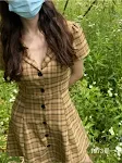 Terno Retro Minority com lapela e saia xadrez. Elegância vintage, design retrô, perfeito para eventos, estilo único e atemporal, expresse sua personalidade com charme. — foto 7
