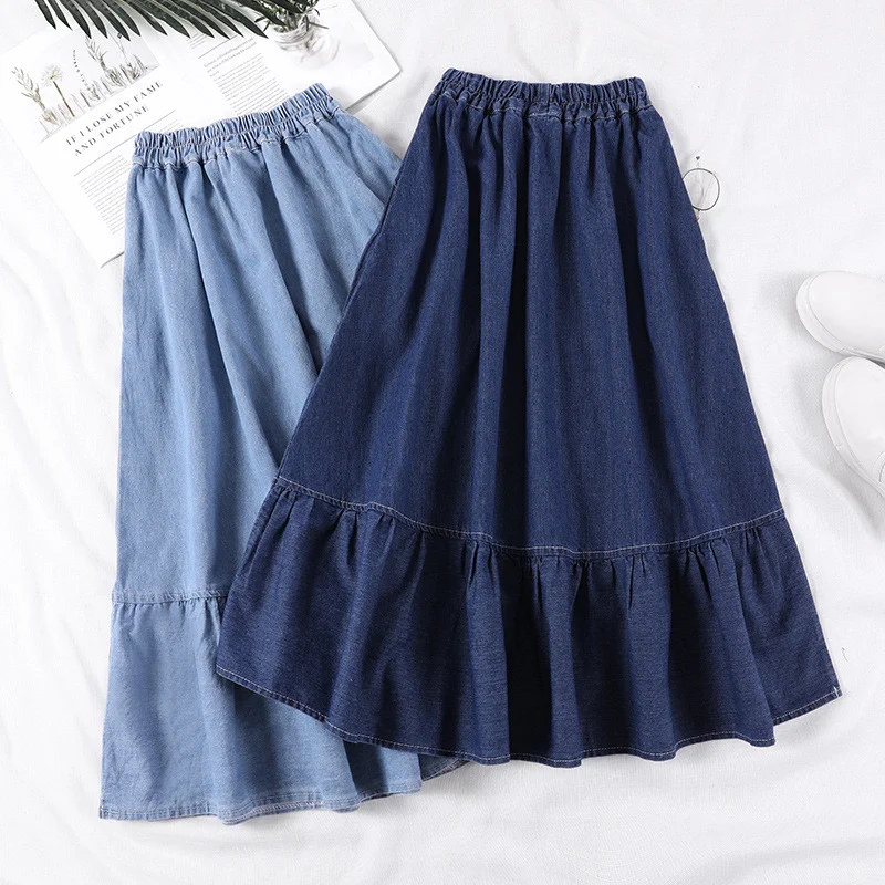 Mid-length high-waisted A-line denim skirt for a flattering and versatile style. Comfortable and stylish, perfect for ev — photo 7