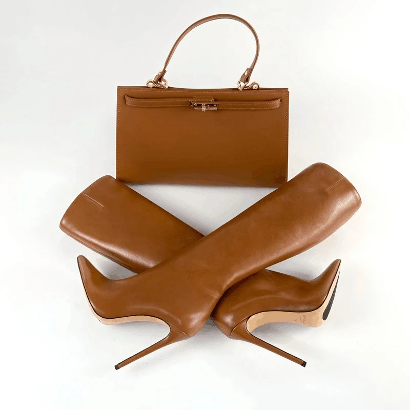Botas femininas de comércio exterior com salto agulha, bico fino e cano alto. Elegância e estilo para mulheres modernas. — foto 1