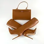 Botas femininas de comércio exterior com salto agulha, bico fino e cano alto. Elegância e estilo para mulheres modernas. — foto 1