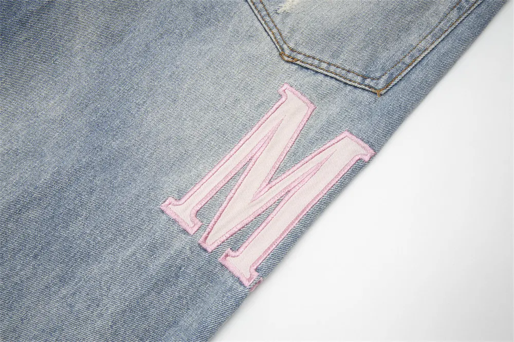 Ripped Beggar Denim Trousers for Men and Women. Stylish, distressed jeans for a modern, casual look. Comfortable fit and — photo 6