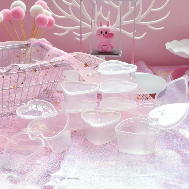 Caixa transparente em formato de coração de pêssego com tampa para slime, pudim e outros. Plástico selado para armazenamento seguro e organizado. — foto 1
