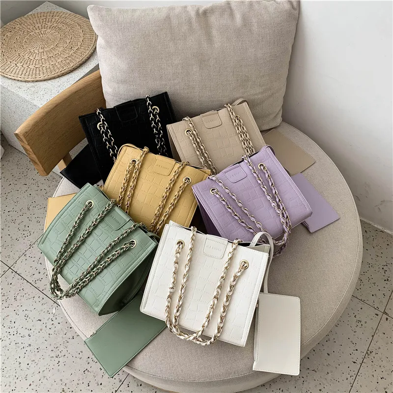 Bolsa quadrada de duas peças, elegante e funcional. Perfeita para organizar seus itens essenciais diários com estilo em qualquer situação. — foto 3