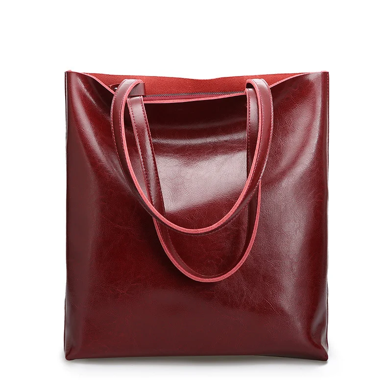 Bolsa feminina de couro de vaca minimalista Grande capacidade Design elegante e funcional Ideal para carregar tudo com estilo e praticidade — foto 1