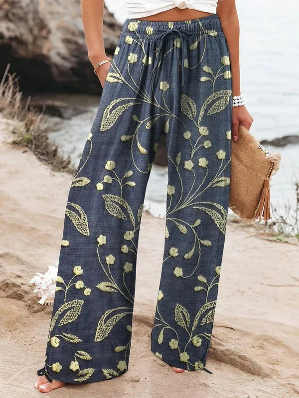 Pantalones con estampado floral artístico, cintura elástica, cordón y bolsillos. Moda y comodidad para tu día a día. — foto 3