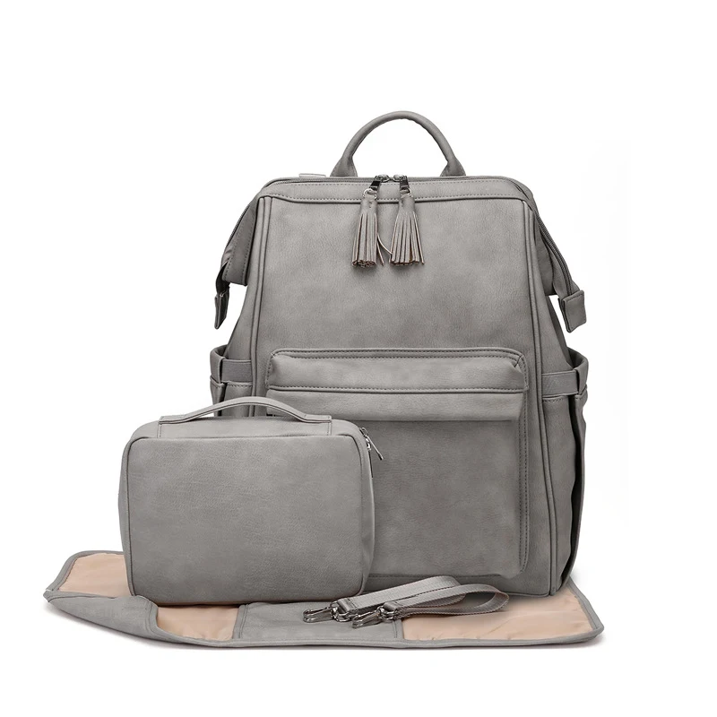Mochila de couro para mamãe, espaçosa e elegante para itens de bebê e uso diário, com compartimentos e design moderno, conforto e praticidade. — foto 2