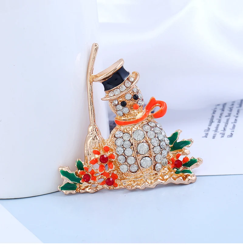Broche de Natal dourado de alta qualidade com boneco de neve, um pin criativo para enfeitar e presentear com elegância. — foto 1