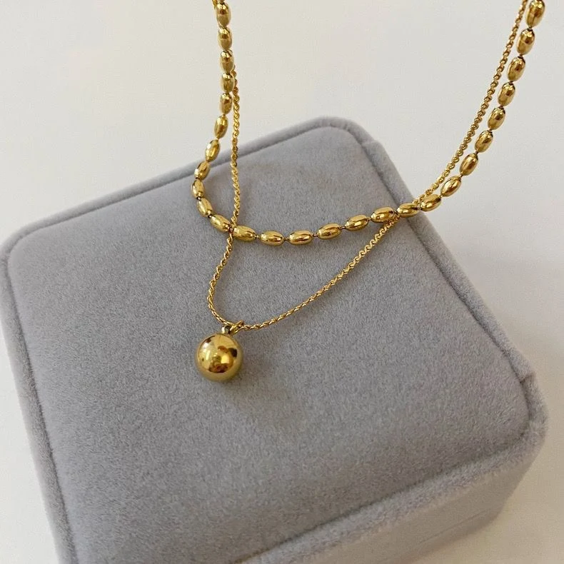 Colar duplo de aço titânio, minimalista e moderno, com bolas de metal, para mulheres gêmeas, estilo tendência fashion — foto 2