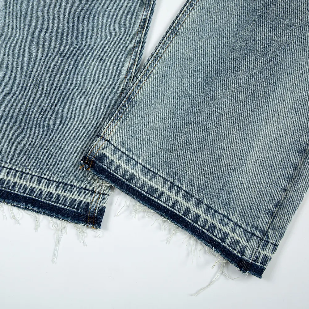 Heren bootcut jeans met water wash en gaten. Een comfortabele en trendy broek voor een casual look. Perfect voor dagelijks gebruik. — foto 15