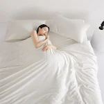 White Cotton Four-Piece Comforter Bed Set. Experience ultimate comfort and a restful night's sleep with this soft and st — photo 1