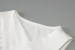 Seksi haljina sa halter kragnom, plisirana i sa ukrasnim detaljima, uska oko kukova, ističe figuru za elegantan izgled. — foto 4