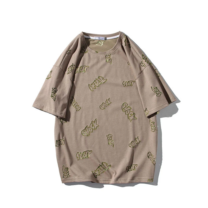 Camiseta masculina de manga curta com letra vazada e gaze solta, gola redonda. Leveza e respirabilidade para o verão, ideal para um visual moderno e confortável. — foto 1