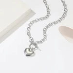 Conjunto feminino de colar e pulseira com pingente de coração em formato de O, perfeito para mulheres que buscam elegância e sofisticação. — foto 1