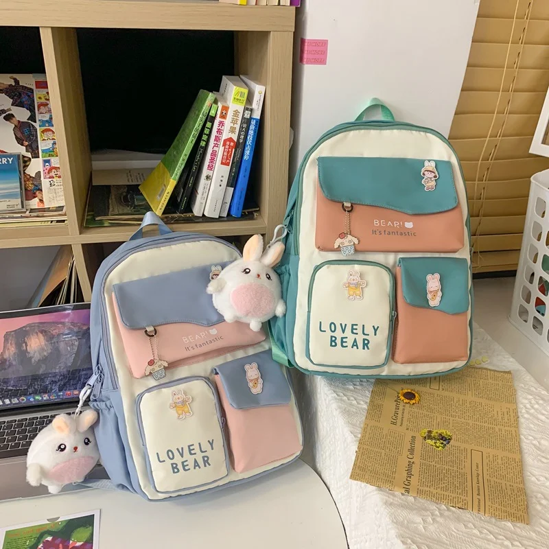 Mochila feminina estilo japonês de grande capacidade, ideal para escola, trabalho e viagens. Espaçosa, prática e com design moderno. — foto 1