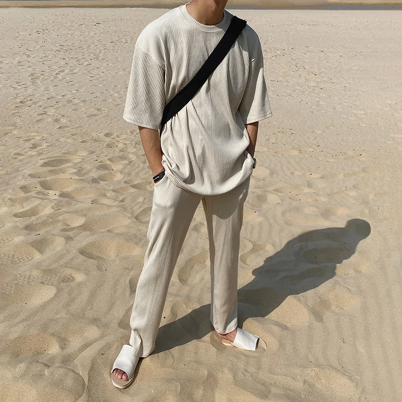 Conjunto de camiseta de seda gelada de manga curta e cor sólida para o verão. Leveza, frescor e estilo para os dias quentes. Conforto garantido. — foto 6